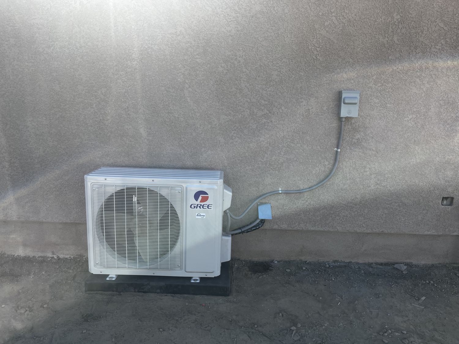 Gree outdoor AC condenser unit with tidy line set and disconnect